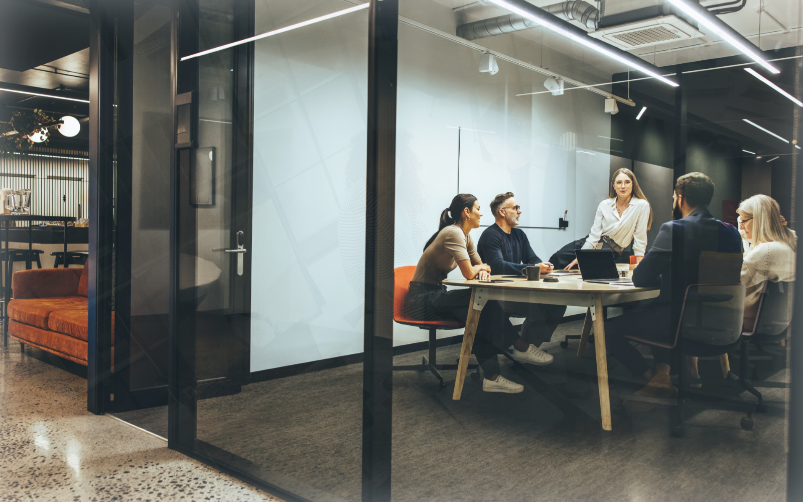 Office workings having discussion in meeting room
